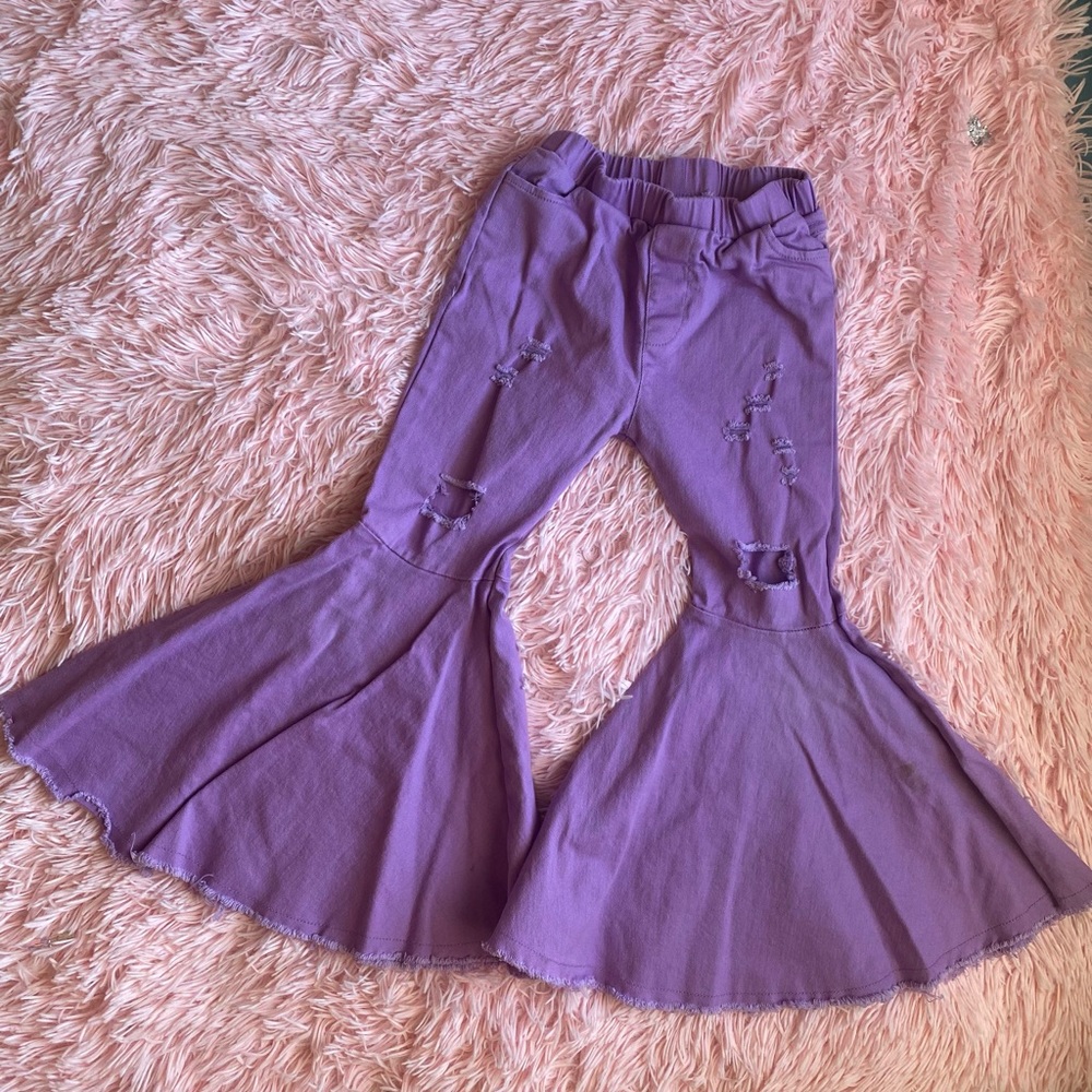 Girls bell bottom ripped jeans